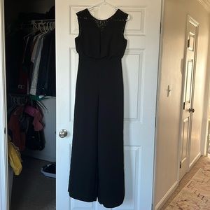 Long black short sleeved dress suit, worn once